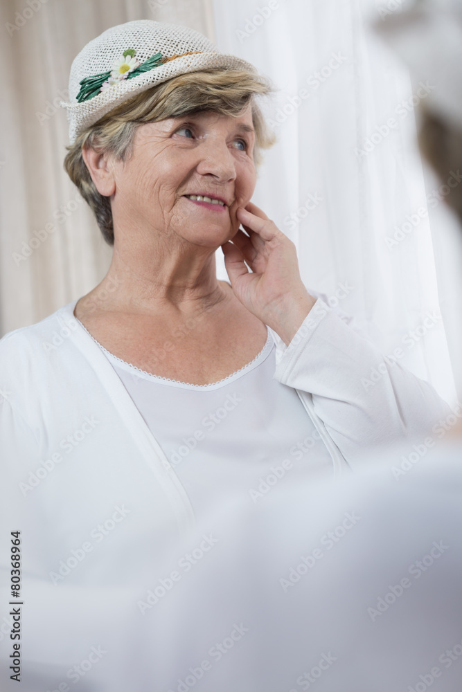 Senior lady wearing boater Senior lady wearing boater