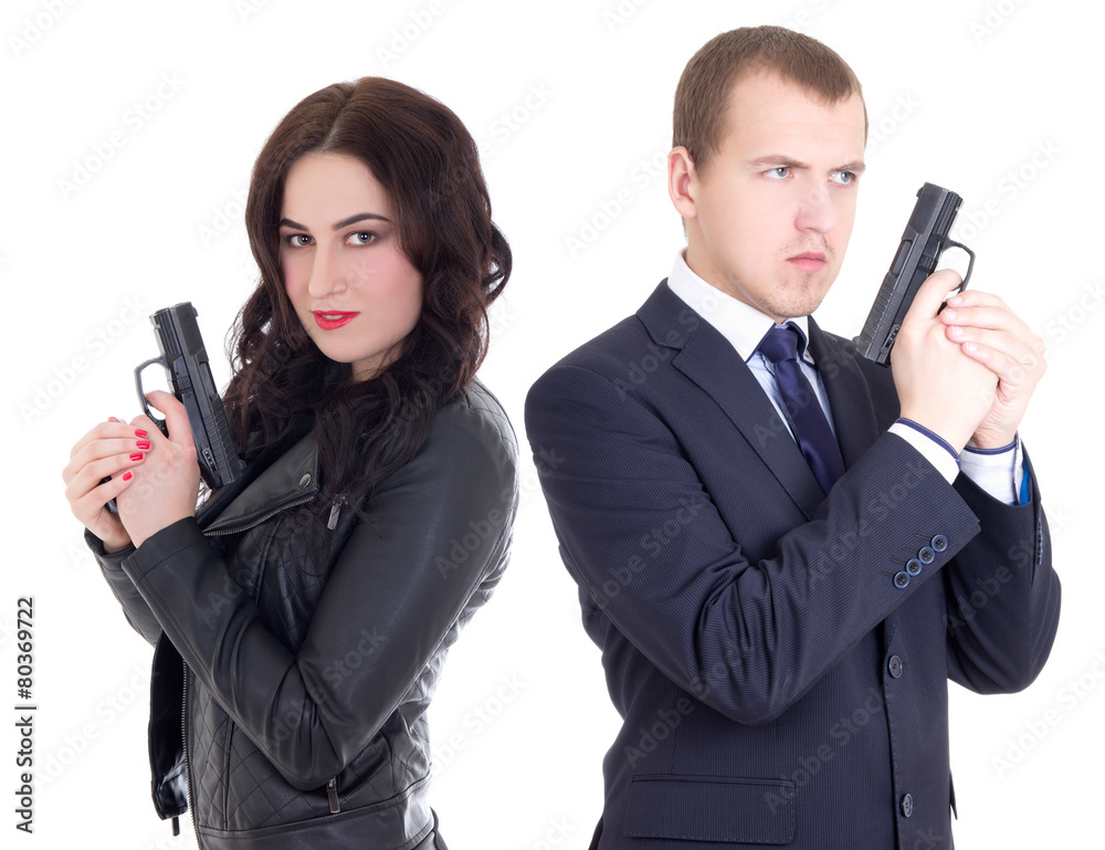 young man in business suit and elegant woman with guns isolated young man in business suit and elegant woman with guns isolated