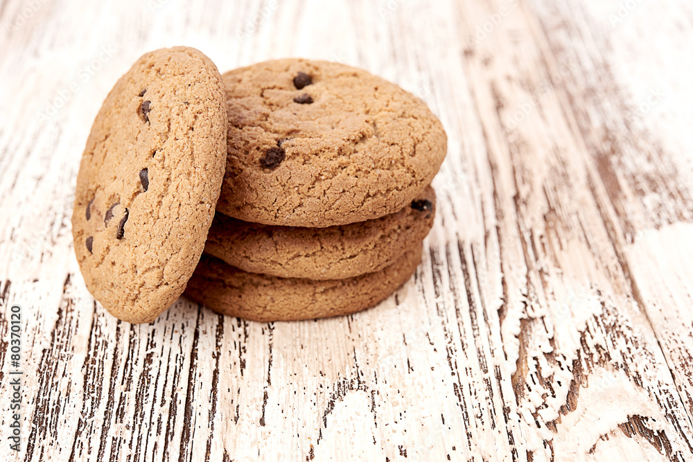 oat cookies on wooden table oat cookies on wooden table