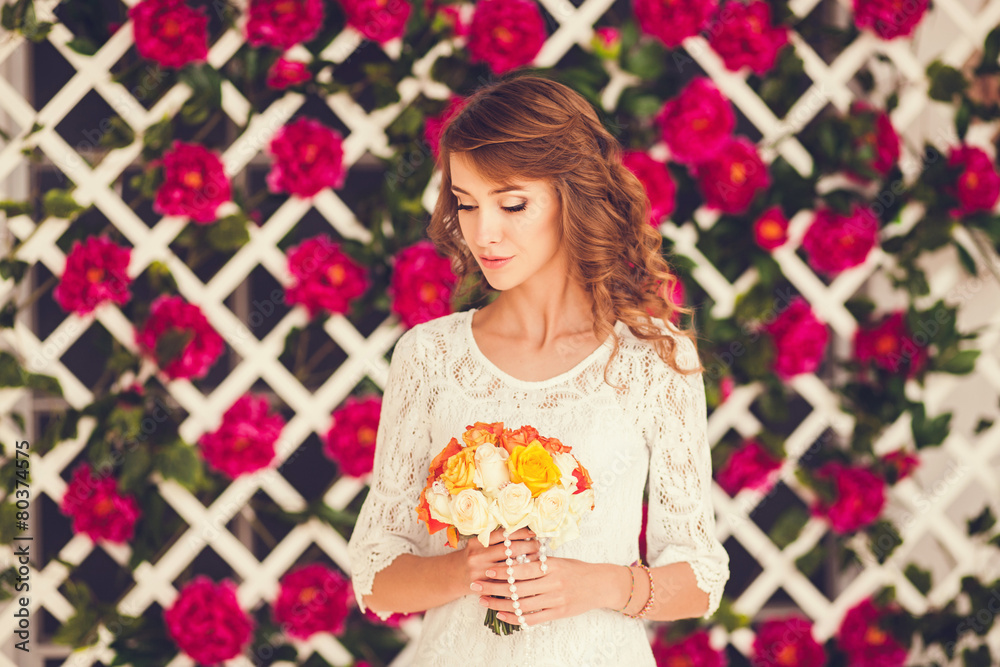 portrait of beautiful girl with flowers in studio portrait of beautiful girl with flowers in studio