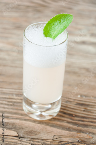 a refreshing drink on a wooden background