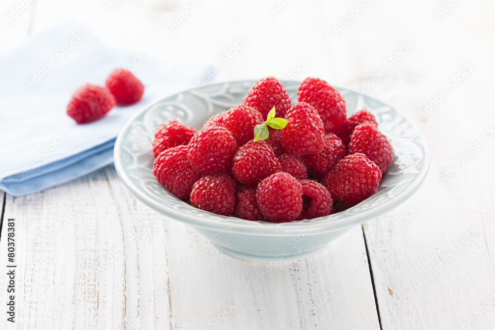 Bowl of juicy raspberries Bowl of juicy raspberries