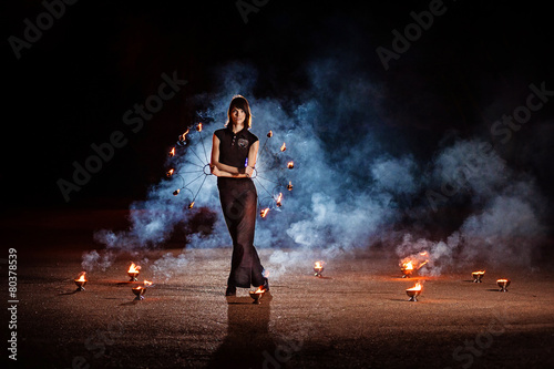 Spectacular fire show with fire dancers