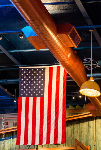 American Flag Hanging from Rafters photo