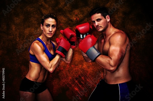 Composite image of boxing couple © WavebreakmediaMicro