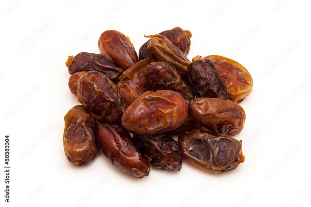 Medjool dates isolated on a white background. Medjool dates isolated on a white background.