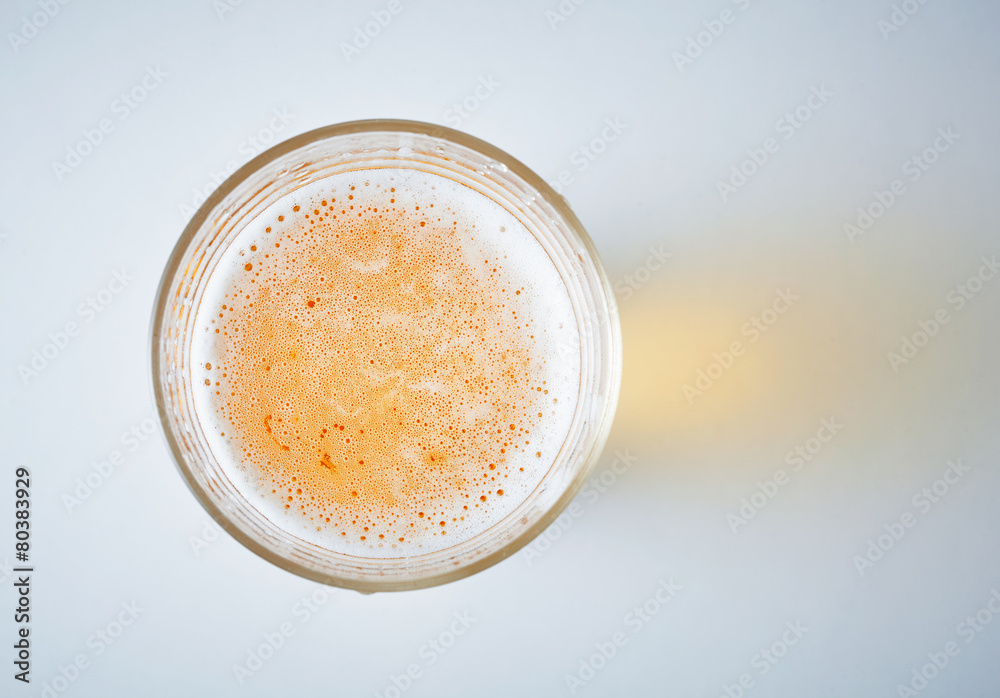 glass full of beer, view from obove glass full of beer, view from obove