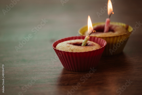 Birthday Banana muffin on wooden background