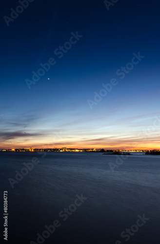 Vertical night landscape of Karlskrona city coast © Piotr Wawrzyniuk