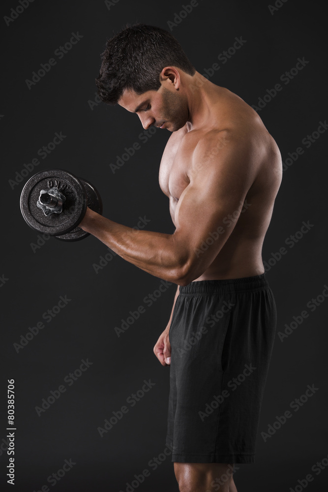 Muscular man lifting weights Muscular man lifting weights