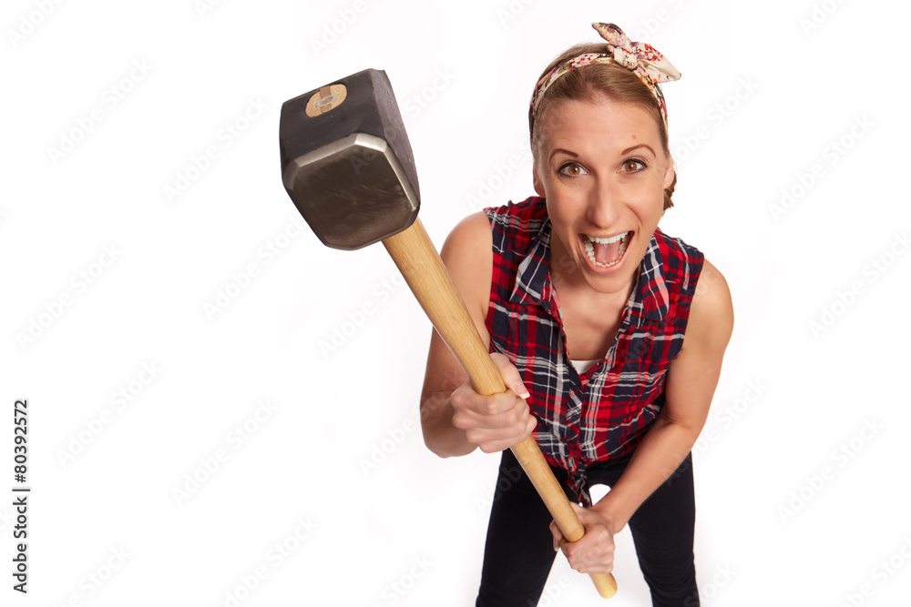 Junge Frau mit einen grossen Hammer Stock Photo | Adobe Stock