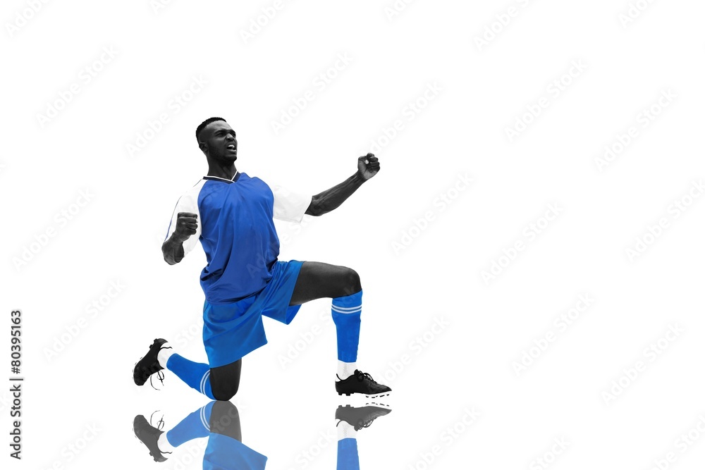 Composite image of cheering football player Composite image of cheering football player
