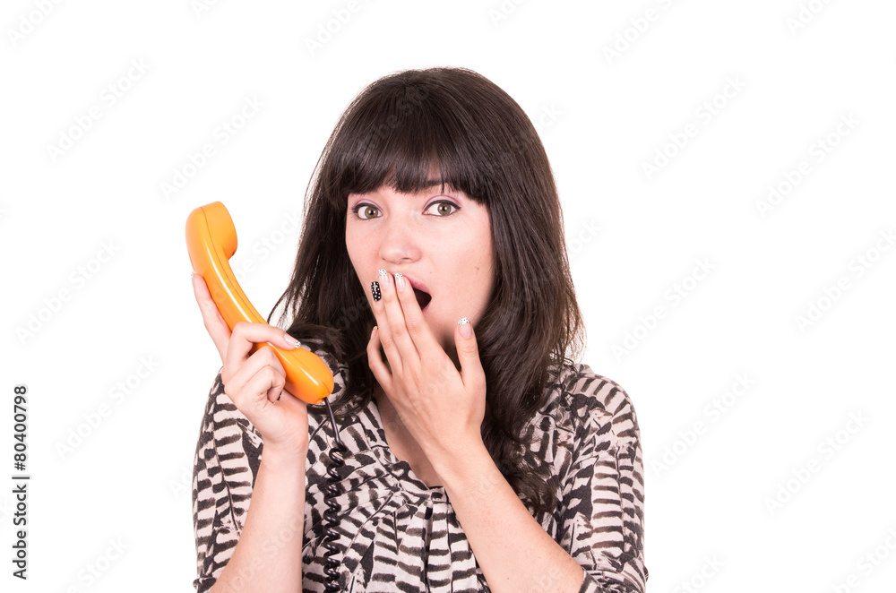 beautiful young woman using retro orange telephone beautiful young woman using retro orange telephone