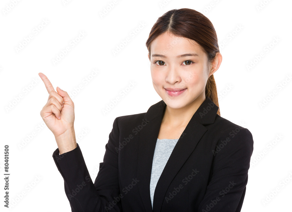 Businesswoman pointing up