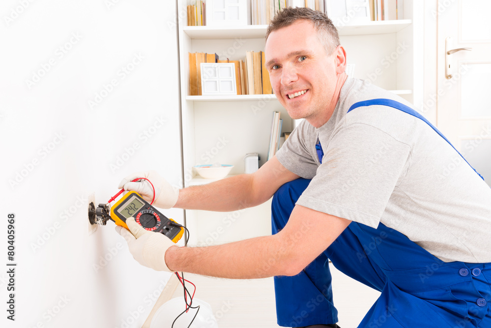 Electrician checking socket Electrician checking socket