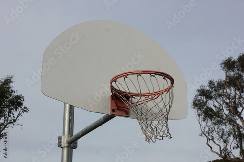 Basketball net blowing in wind
