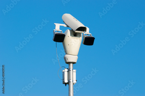 Surveillance Camera and Blue Sky