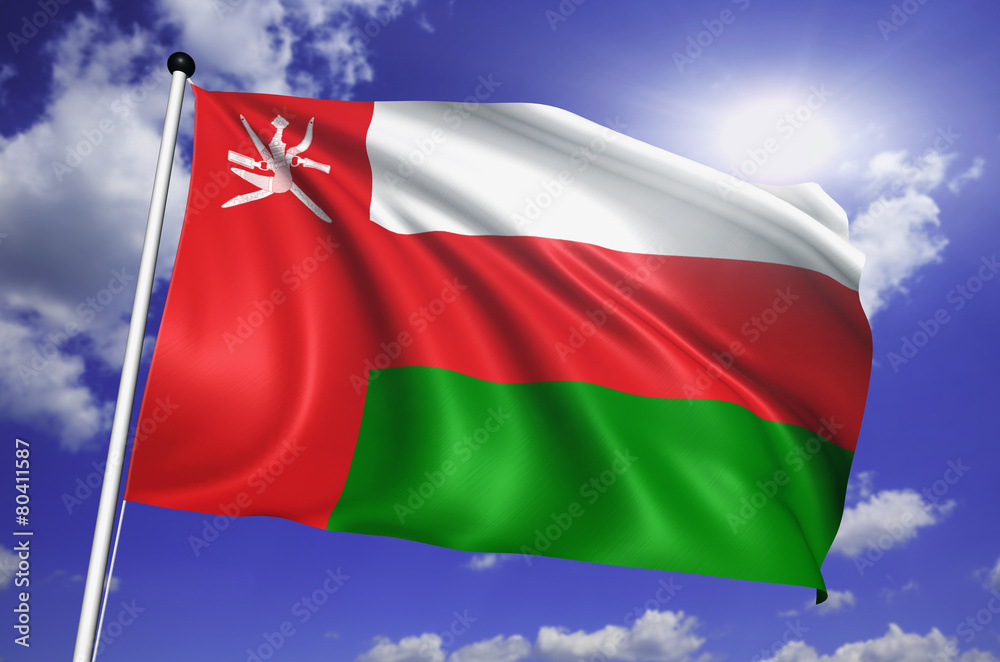 Oman flag with fabric structure against a cloudy sky