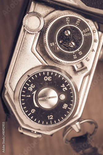 Close up of old fashioned retro camera in vintage style