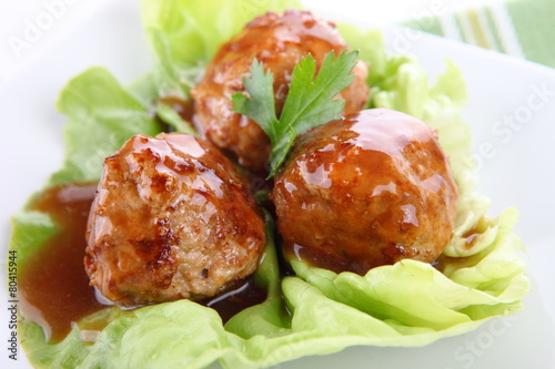 meatballs with sauce and lettuce