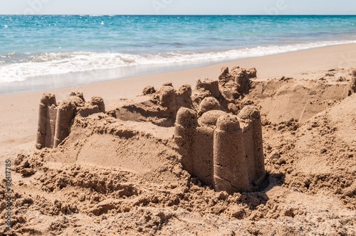 Sand castle on the sea shore