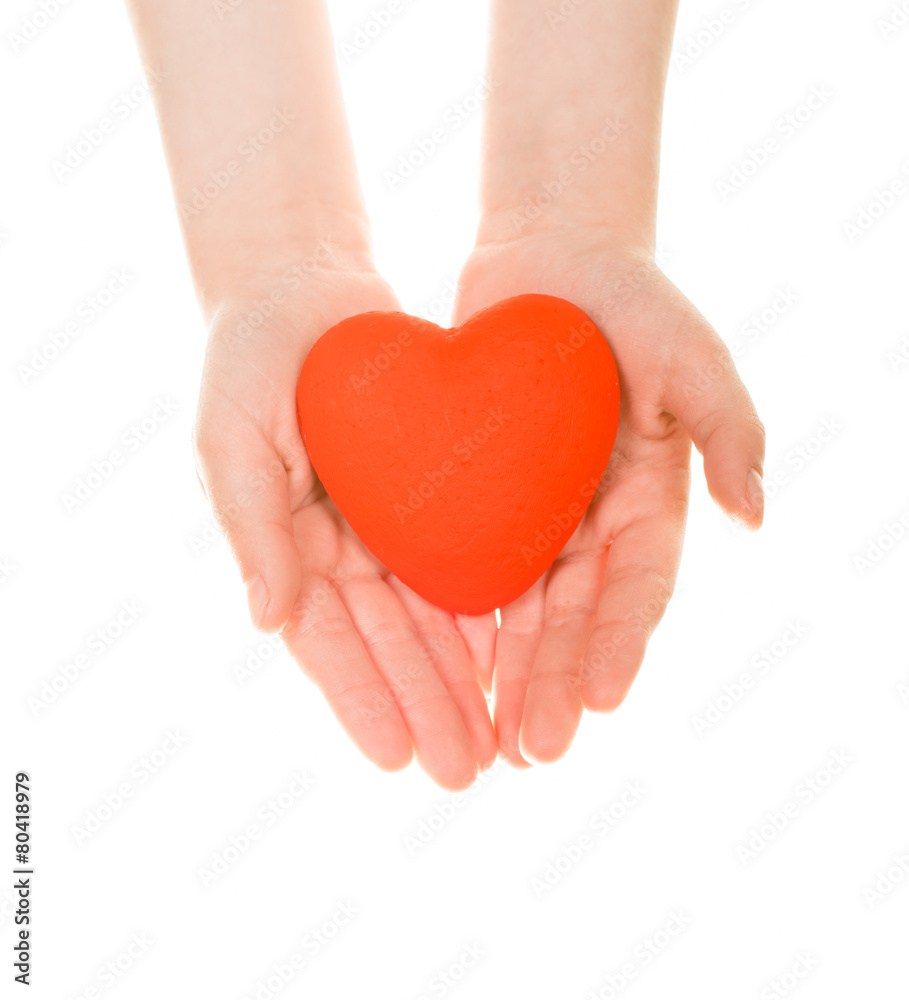 Red heart in hands, isolated on white Red heart in hands, isolated on white