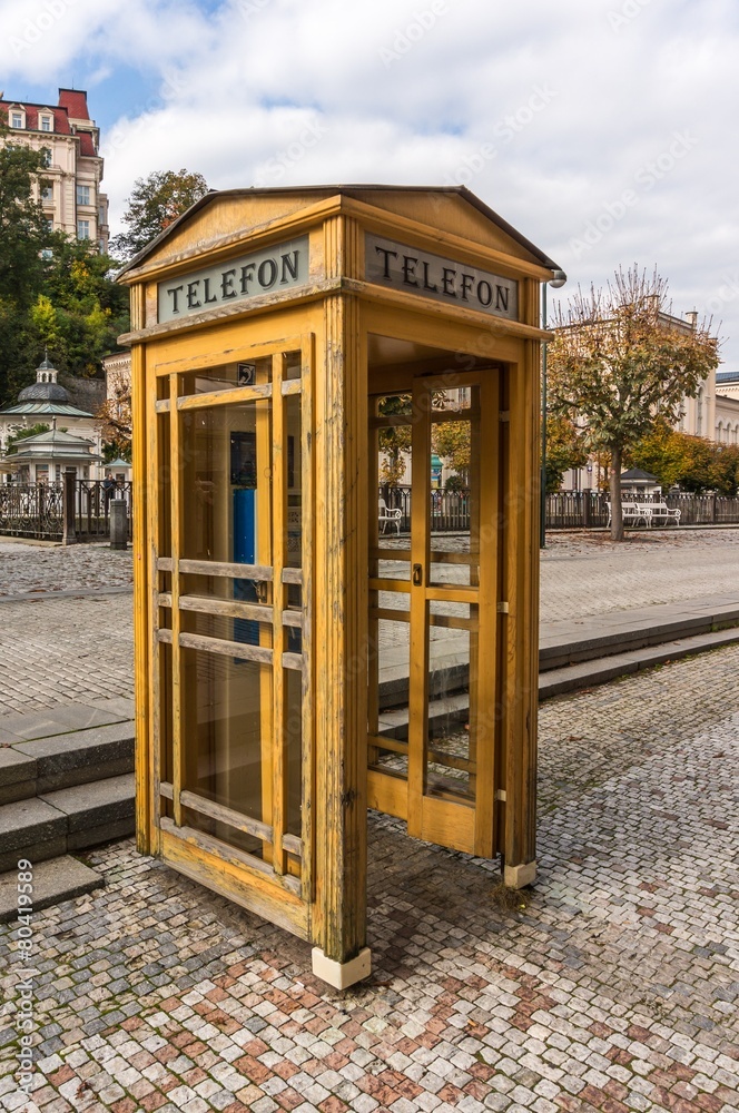 Fototapeta premium Yellow phone booth in Carlsbad