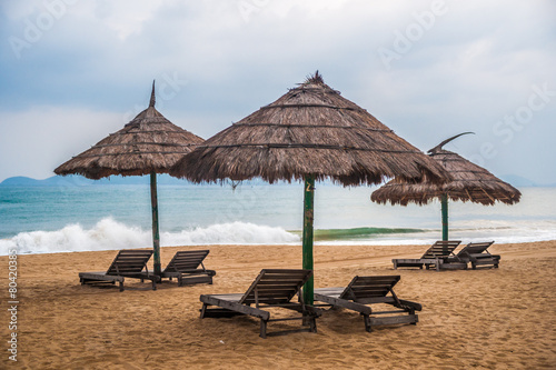 Simple scene with straw umbrella