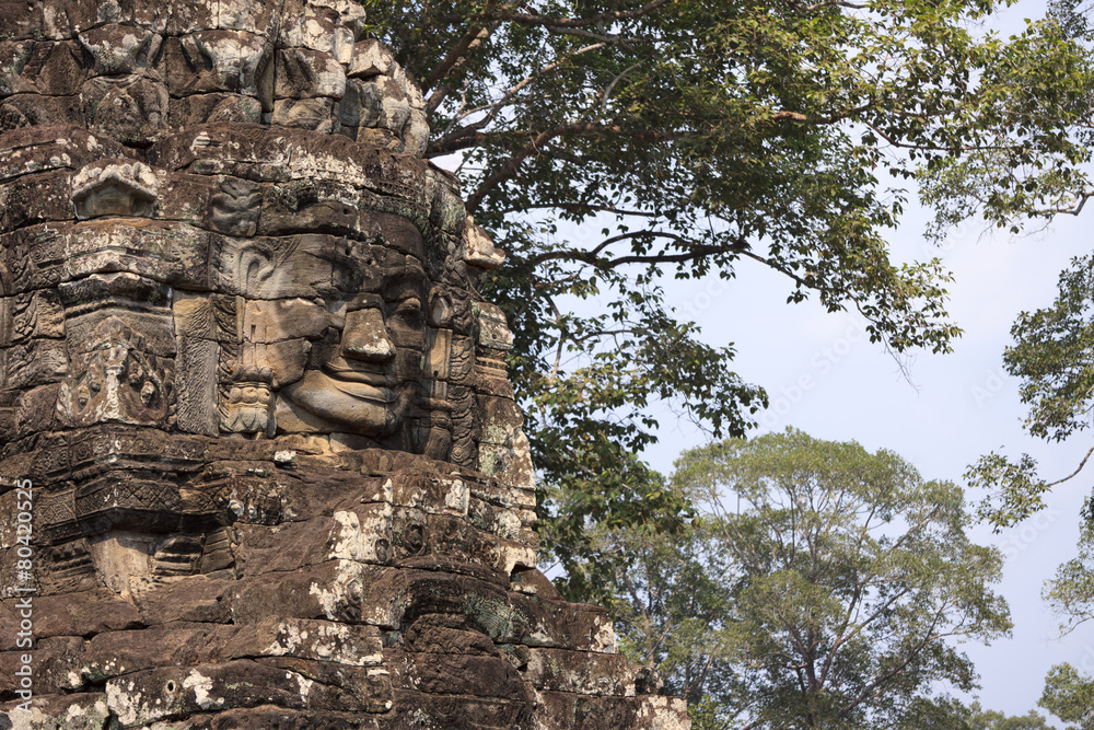 Stone face in Bayon temple in ancient city Angkor