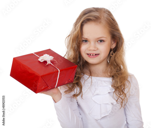 Happy little girl with gift box