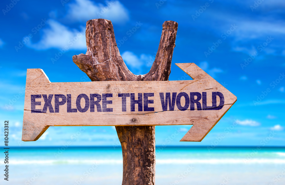 Explore the World sign with a beach on background