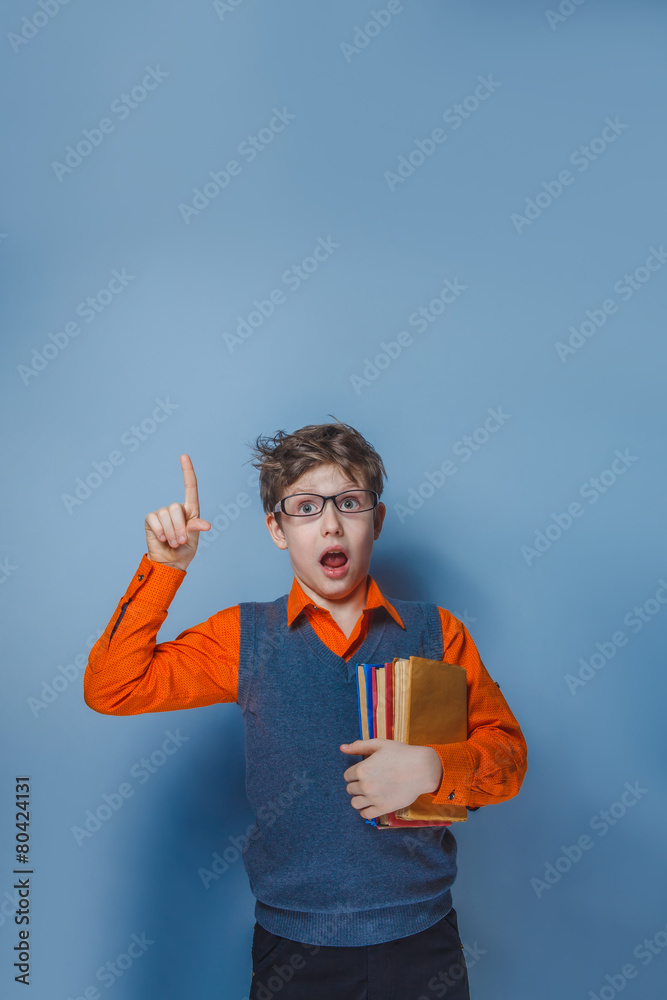 European-looking boy of ten years in glasses thumbs up, the European-looking boy of ten years in glasses thumbs up, the