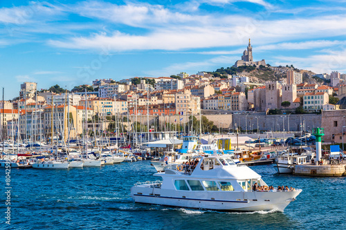 Notre Dame de la Garde and olf port in Marseille, France photo