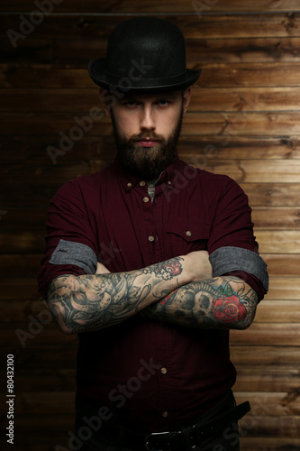 Handsome man with tattoos photo