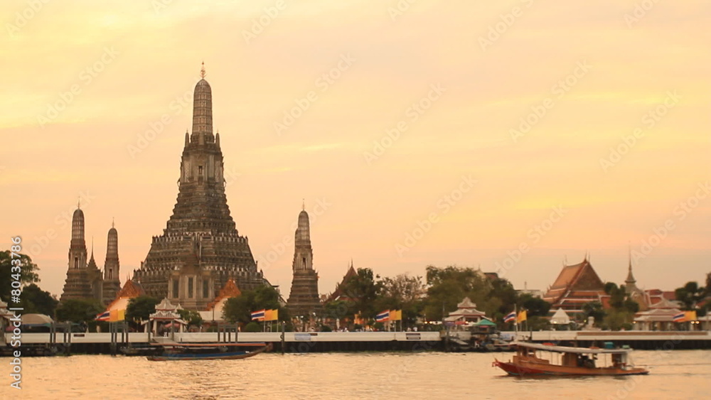 Twilight view of Wat Arun across Chao Phraya River during sunset Twilight view of Wat Arun across Chao Phraya River during sunset
