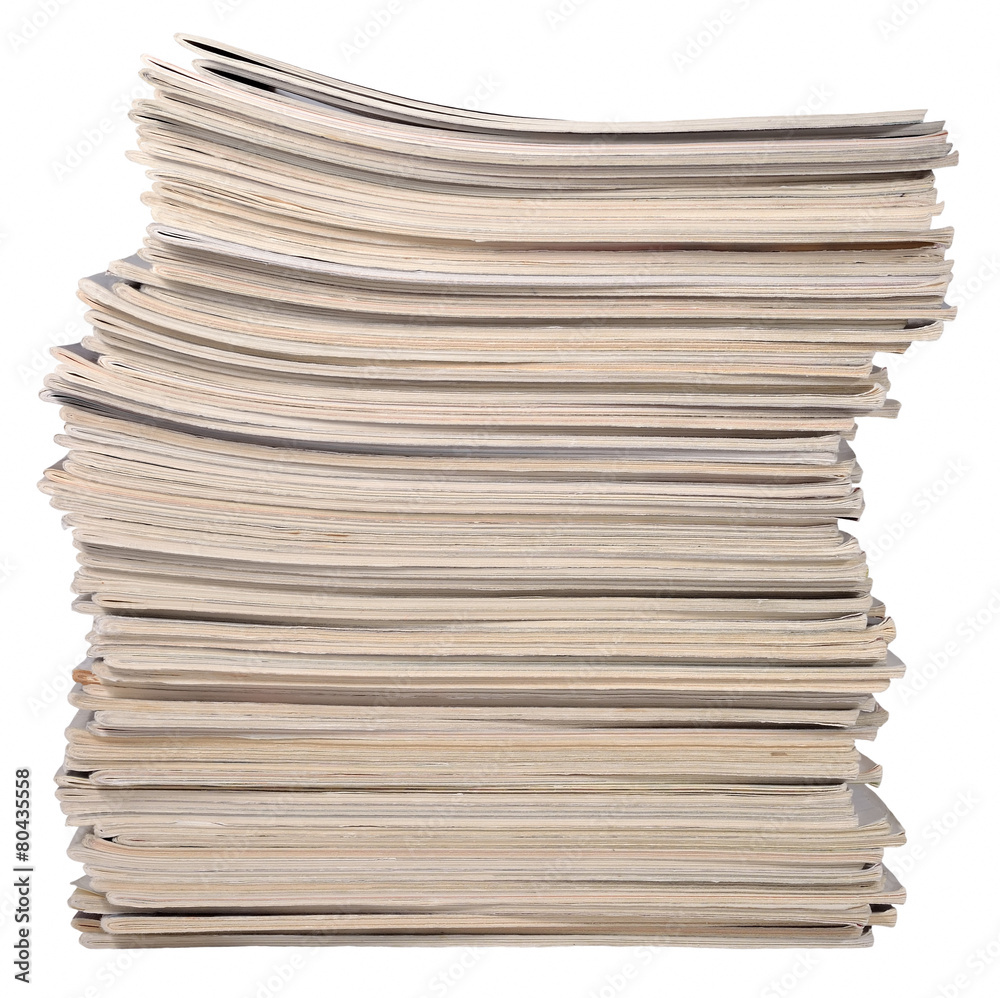 Stack of old magazines on a white Stack of old magazines on a white