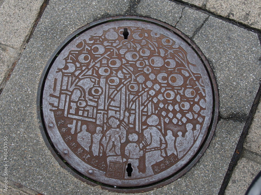 manhole drain cover on the street at Ximen in Taipei, Taiwan.