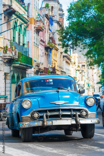 Vintage american car on a street in downtown Havana © kmiragaya