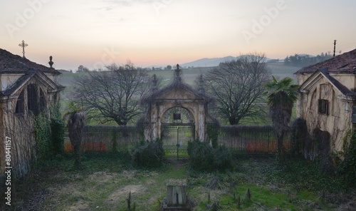 Old abandoned gate of an ancient villa.