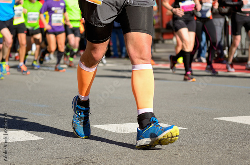 Marathon running race, runners feet on road, sport concept © Iuliia Sokolovska