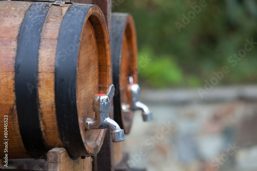 the barrels with wine standing on street