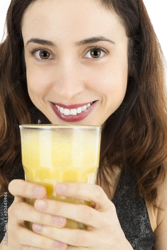 Close up of woman with a glass of banana smoothie Close up of woman with a glass of banana smoothie
