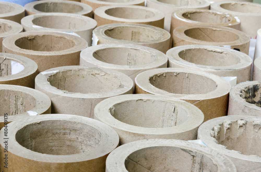Cylinders cardboard background of Rolled paper in print house