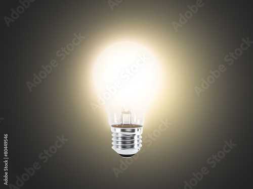 Lightbulb on a dark background (render)