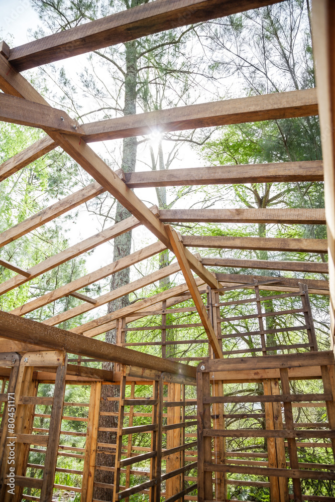 Obraz premium Timber Cabin At Construction Site