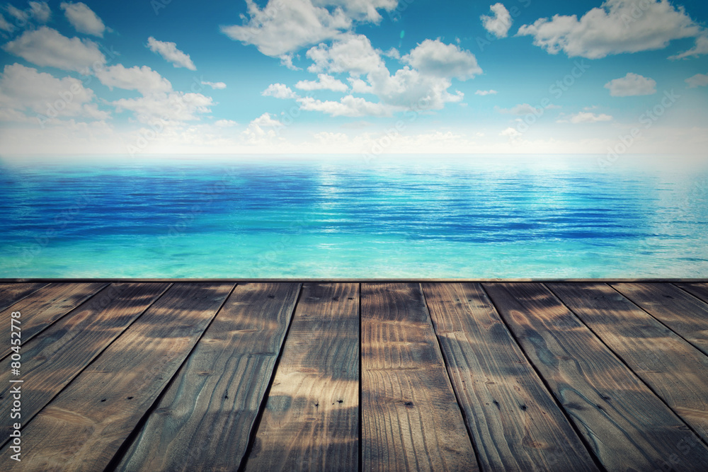 wooden paving and the beach.