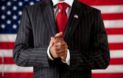 Canvas Print Politician: Man with Hands Clasped