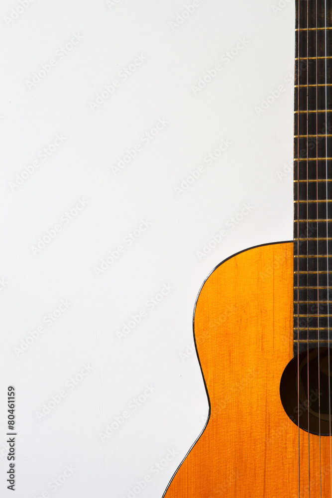 Orange acoustic guitar finger-board