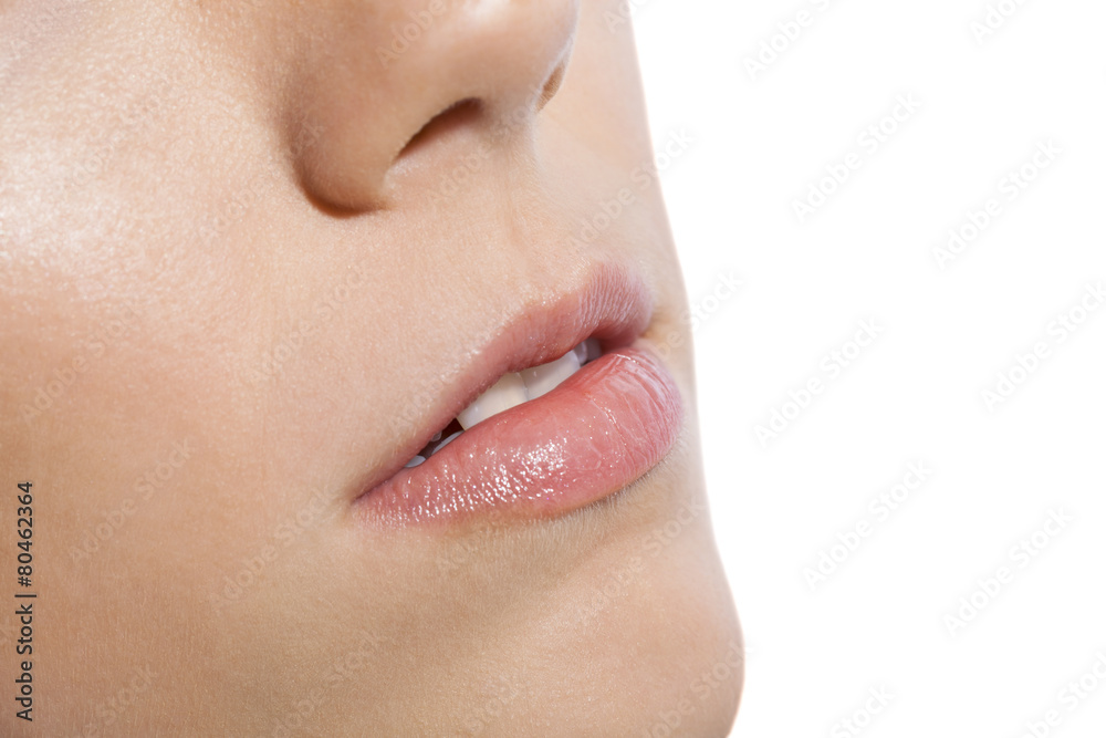 Close up Pink Lips of a Woman on White Background Close up Pink Lips of a Woman on White Background