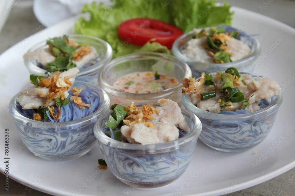 Crake noodles with steamed pork and coconut milk. Crake noodles with steamed pork and coconut milk.
